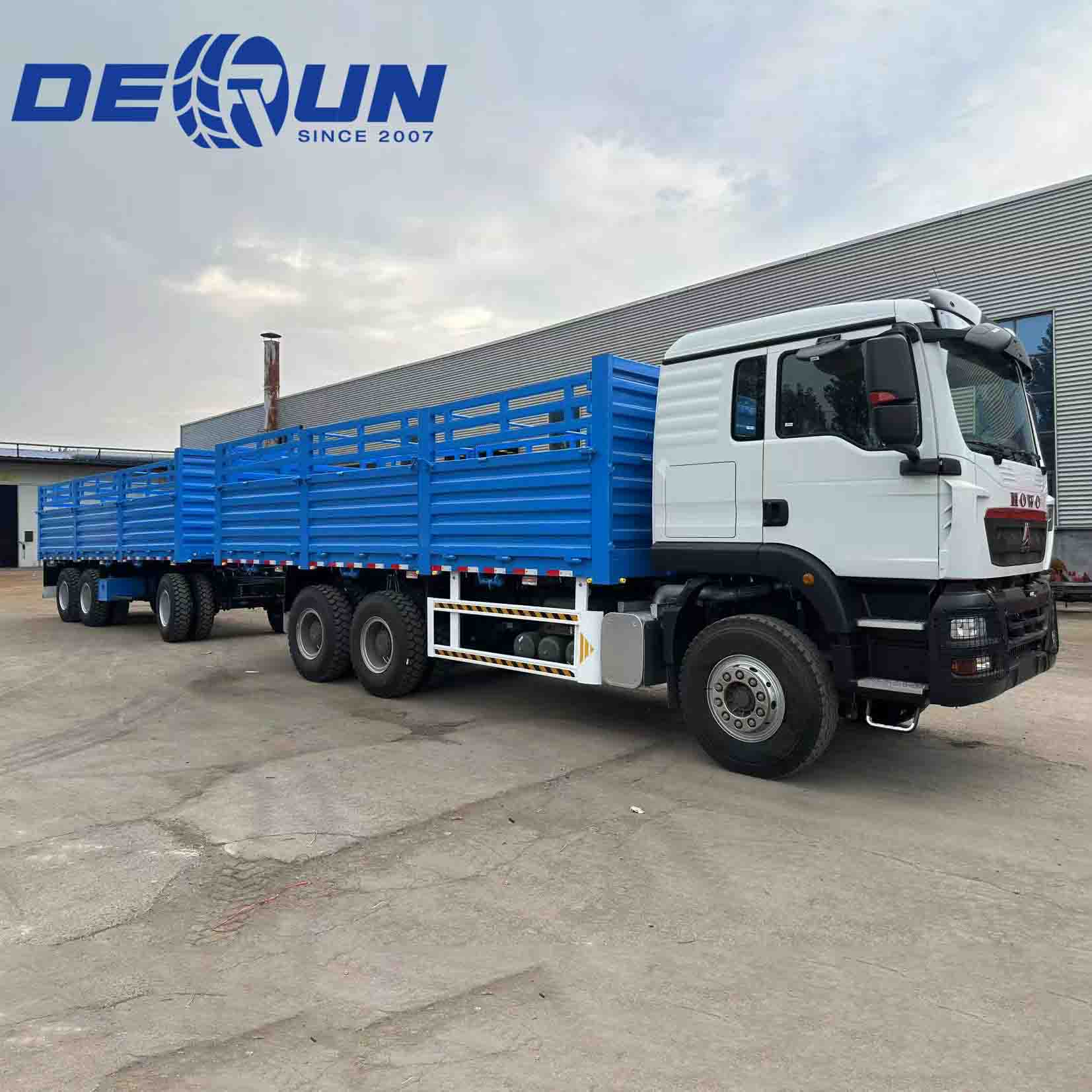 Sinotruk Howo TX 6x4 -aita -kuorma -auto 3 akselin vetopalkin perävaunulla